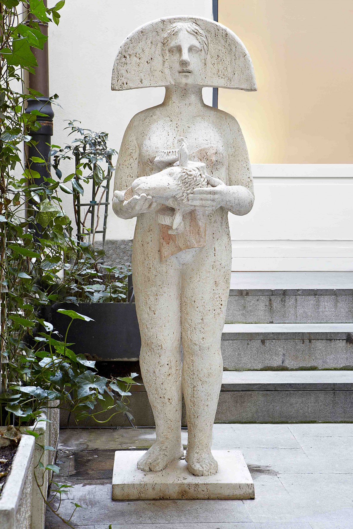 Donna con testa d'ariete, Female figure with aries head, 1998, travertino, travertine, cm.45x45x141h
